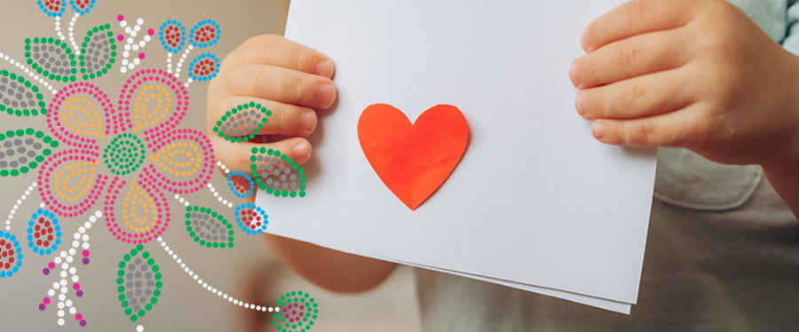 Child's hand holding an envelope with a heart with an overlay of colourful Metis bead pattern